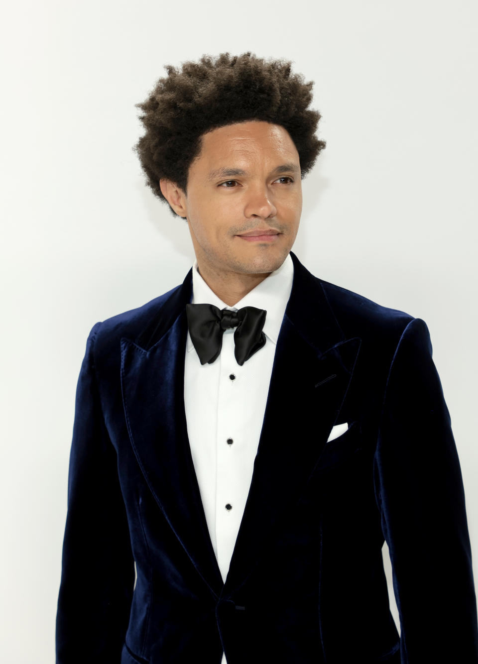 Trevor Noah wearing a suit.