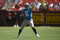 Carolina Panthers quarterback Baker Mayfield (6) gestures during the first half of a preseason NFL football game against the Washington Commanders, Saturday, Aug. 13, 2022, in Landover, Md. (AP Photo/Nick Wass)