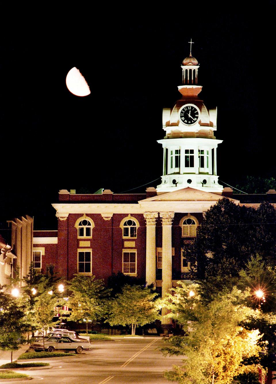 The moon shines its light on the Rutherford County Courthouse in the square of Murfreesboro, Tenn., on a quiet night June 21, 1992.