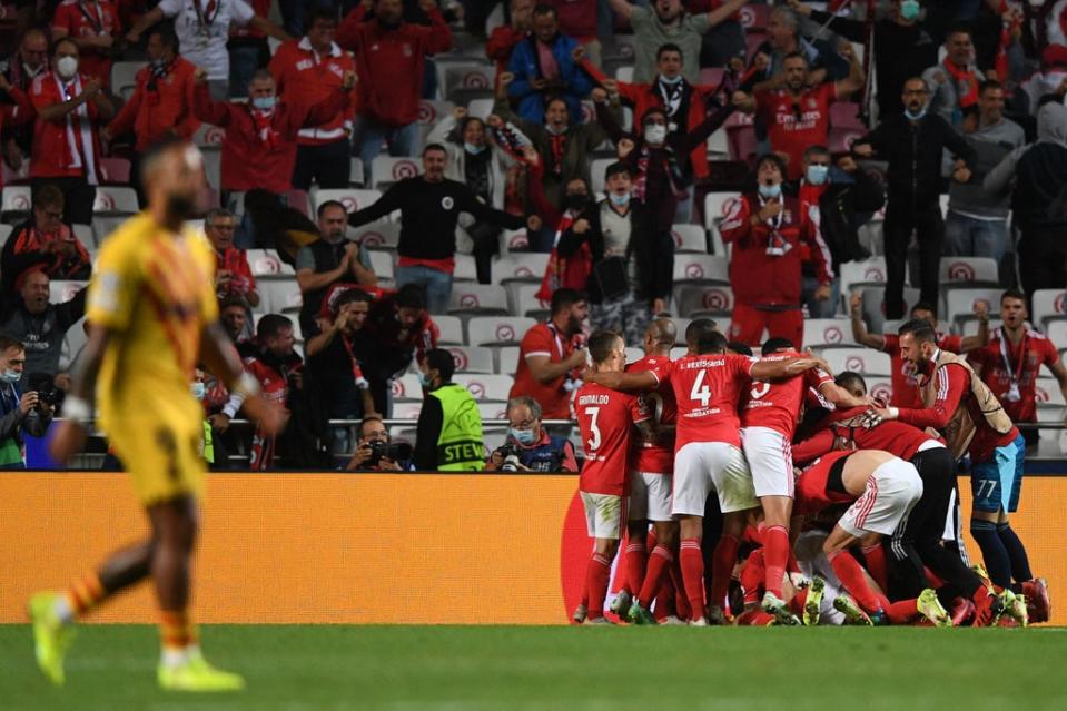 Benfica’s players celebrate Rafa Silva’s goal (AFP)