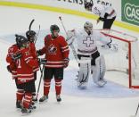 Canada's Griffin Reinhart (C), celebrates his goal on Switzerland's goalie Melvin Nyffeler (R) with teammates Mathew Dumba (24), Scott Laughton (21), and Sam Reinhart during the first period of their IIHF World Junior Championship ice hockey game in Malmo, Sweden, January 2, 2014. REUTERS/Alexander Demianchuk (SWEDEN - Tags: SPORT ICE HOCKEY)