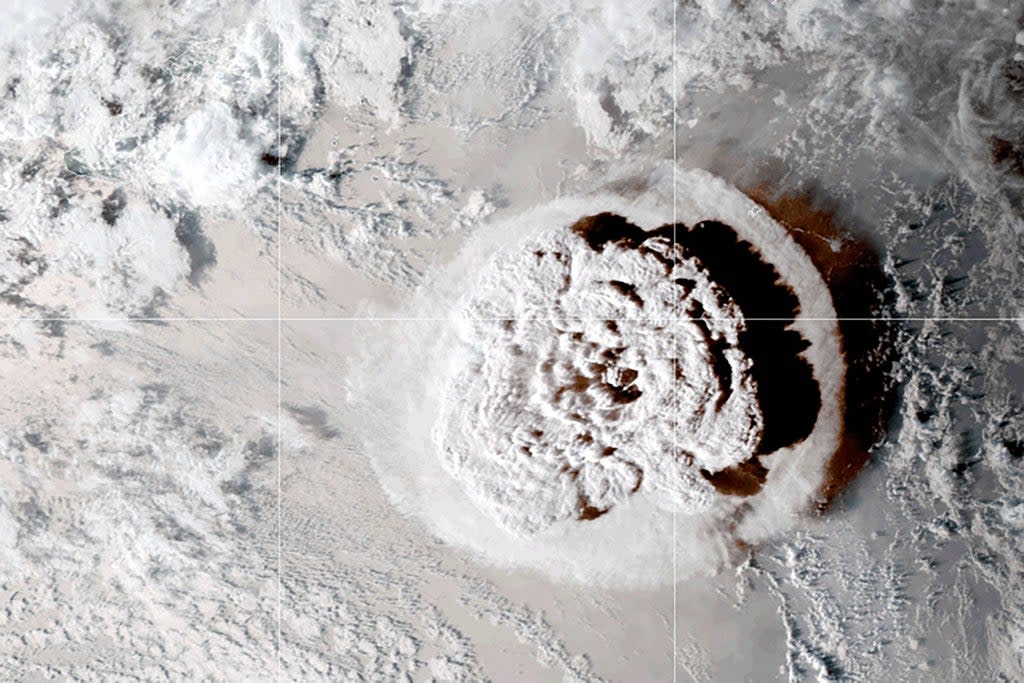 Eruption of the Hunga-Tonga Hunga Ha’apai volcano in Tonga that provoked a tsunami (NASA/NOAA/AFP via Getty Images)