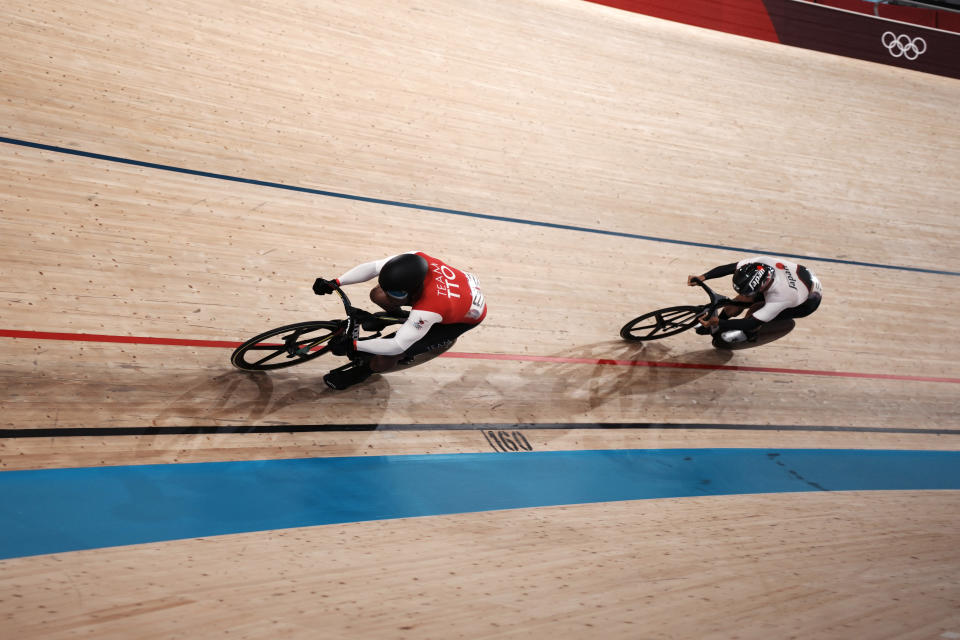 Nicholas Paul of Team Trinidad And Tobago, left, and Yuta Wakimoto of Team Japan competes during the track cycling men's sprint race at the 2020 Summer Olympics, Thursday, Aug. 5, 2021, in Izu, Japan. (AP Photo/Thibault Camus)