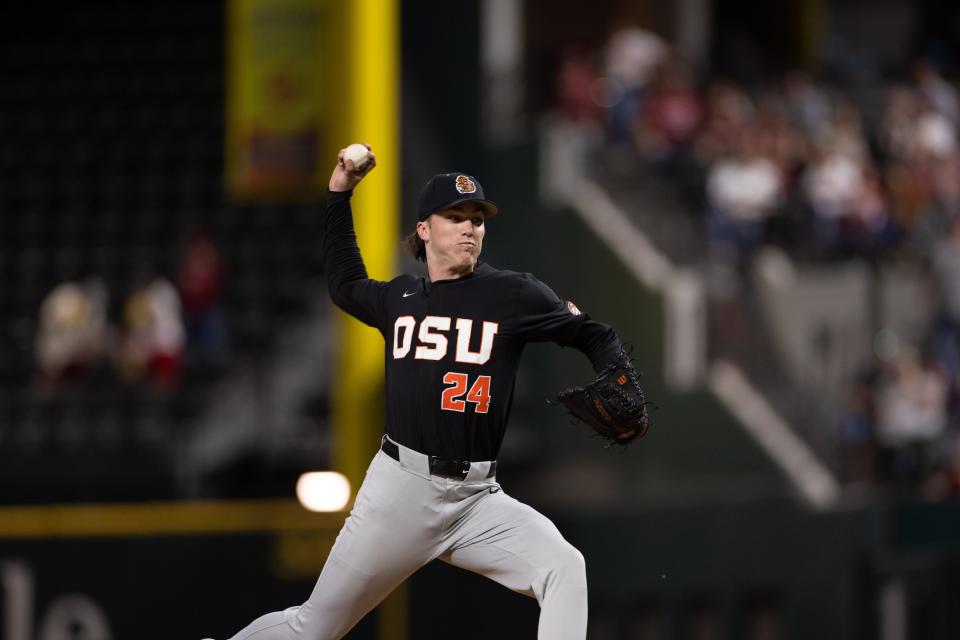 Oregon State's Aiden May pitches against the Arkansas Razorbacks during the Kubota College Baseball Series at Globe Life Field Feb. 23, 2024, in Arlington, Texas.