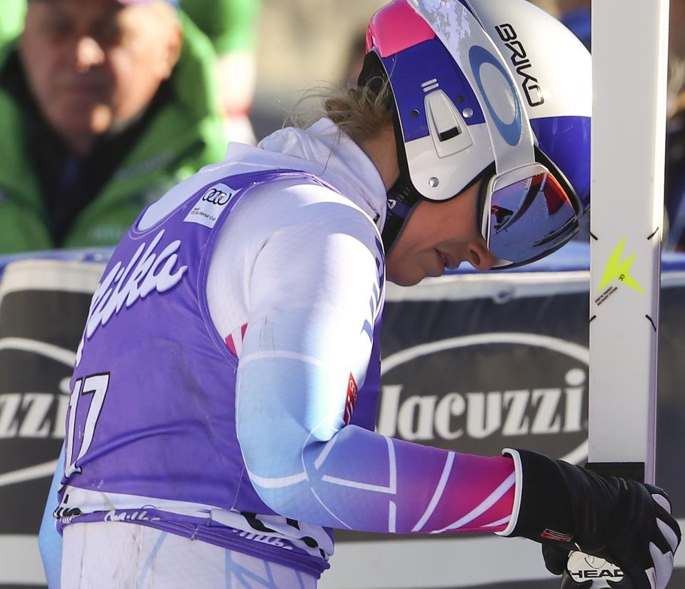 United States' Lindsey Vonn gets to the finish area of an alpine ski, women's World Cup downhill race, in Cortina d'Ampezzo, Italy, Saturday, Jan. 28, 2017. (AP Photo/Alessandro Trovati)