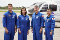 SpaceX Crew 2 members, from left, European Space Agency astronaut Thomas Pesquet, NASA astronauts Megan McArthur and Shane Kimbrough and Japan Aerospace Exploration Agency astronaut Akihiko Hoshide gather at the Kennedy Space Center in Cape Canaveral, Fla., Friday, April 16, 2021 to prepare for a mission to the International Space Station. The launch is targeted for April 22. (AP Photo/John Raoux)