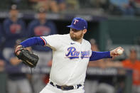 Texas Rangers starting pitcher Jordan Montgomery throws against the Houston Astros during the first inning in Game 5 of the baseball American League Championship Series Friday, Oct. 20, 2023, in Arlington, Texas. (AP Photo/Godofredo A. Vásquez)