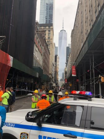 New York police shut off John Street near the Fulton Street subway station as police said they were investigating two suspicious packages in Manhattan