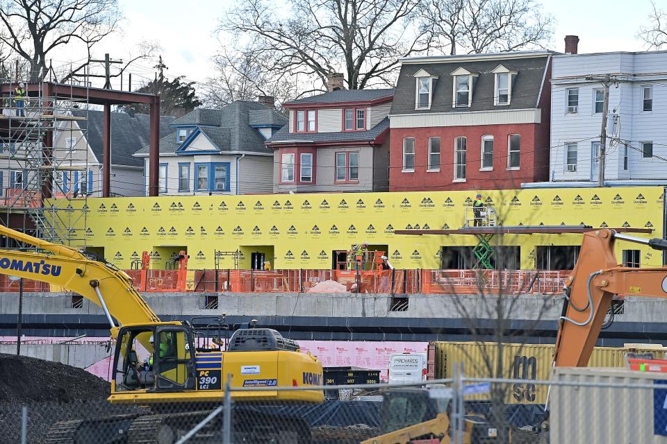 Construction continued Monday, Dec.18, 2023, on the Hagerstown Multi-Use Sports and Events Facility in downtown Hagerstown. This view shows work along the third base side. The homes in the background are along Summit Avenue.