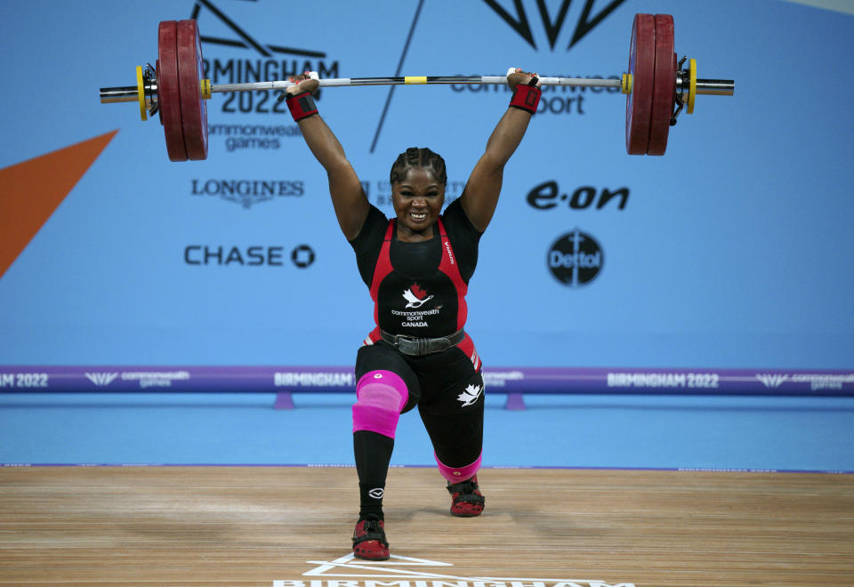 Canada's Maya Laylor lifts to win the gold medal, during the Women's 76kg weightlifting competition at The NEC on day five of the 2022 Commonwealth Games in Birmingham, England, Tuesday, Aug. 2, 2022. (Peter Byrne/PA via AP)