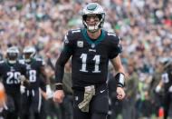 Nov 5, 2017; Philadelphia, PA, USA; Philadelphia Eagles quarterback Carson Wentz (11) reacts to a touchdown pass against the Denver Broncos during the first quarter at Lincoln Financial Field. Bill Streicher-USA TODAY Sports