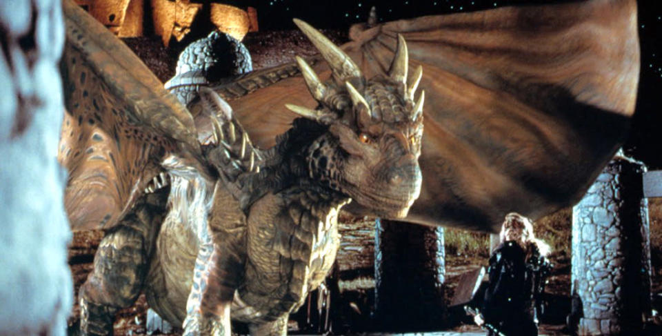 <p>Dennis Quaid buddies up with this noble dragon in the 1996 fantasy. (Photo: Everett) </p>