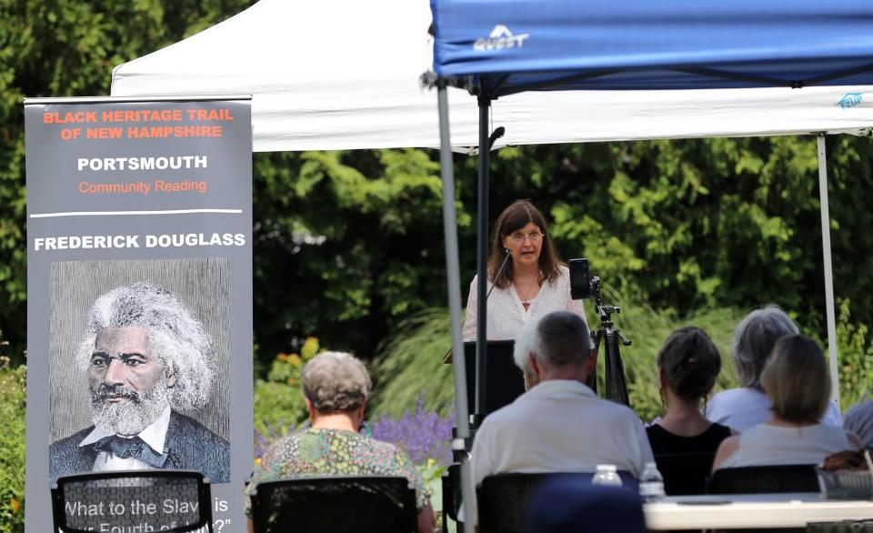 Barbara Ward reads from Frederick Douglass' “What to the slave is your Fourth of July?” speech at 
Strawbery Banke Museum in Portsmouth Friday, July 1, 2022.