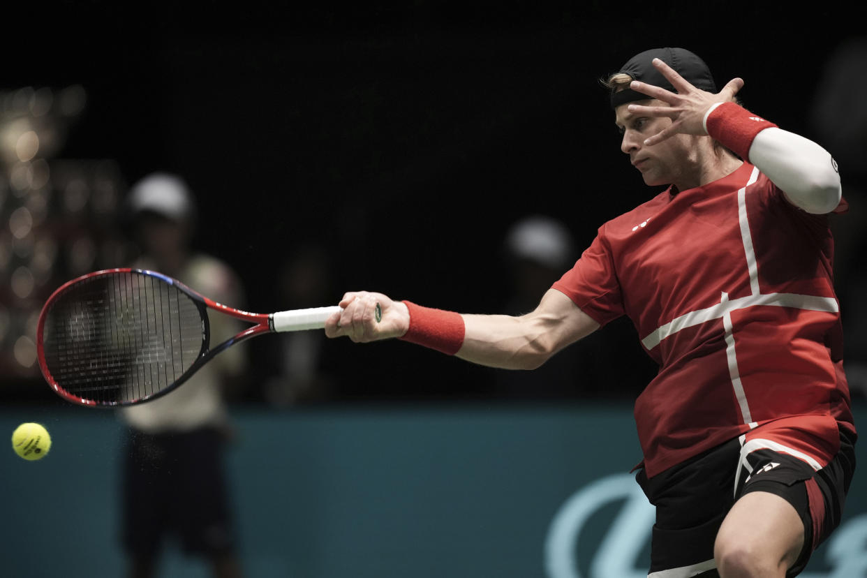 Belgium's Zizou Bergs plays Brazil's Thiago Monteiro during their Davis Cup tennis match at the Unipol Arena, in Bologna, Italy, Sept. 14, 2024. ( Massimo Paolone/LaPresse via AP)