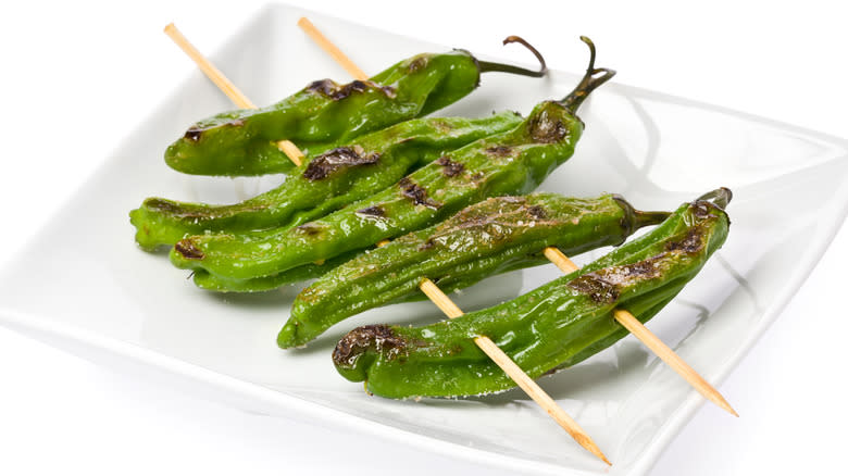 skewered shishito peppers