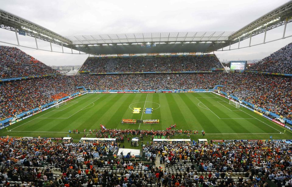 Netherlands and Argentina players stand for the anthem before the 2014 World Cup semi-finals between Argentina and the Netherlands at the Corinthians arena