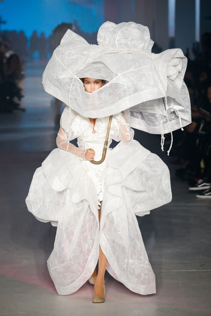 Bella Hadid also took to the runway in an 18th century inspired wedding down [Photo: Getty]