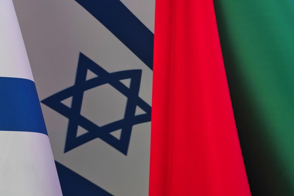 An Israeli flag flutters next to an Emirati flag at Israel's pavilion at Expo 2020 in Dubai, United Arab Emirates, Thursday, Oct. 7, 2021. Israel ceremonially opened its gleaming pavilion at the world's fair in Dubai on Thursday, over a year after normalizing ties with the United Arab Emirates and amid a pandemic that has disrupted much of the tourist and cultural exchanges promised by the U.S.-brokered accords. (AP Photo/Jon Gambrell)