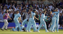 England players celebrate after winning the Cricket World Cup (AP Photo/Matt Dunham)