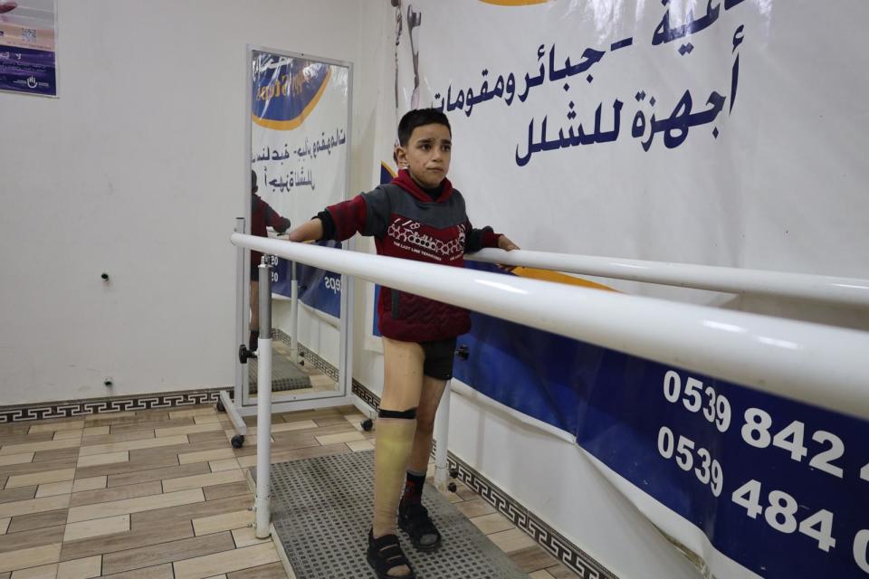 PHOTO: Abdelkader Madrati, 10, on a balance-training device on March 19, 2024, in the Happy Steps Center, in the city of Azaz, north of Aleppo, Syria.  (Abdul Razzaq Al-Shami/ABC News)