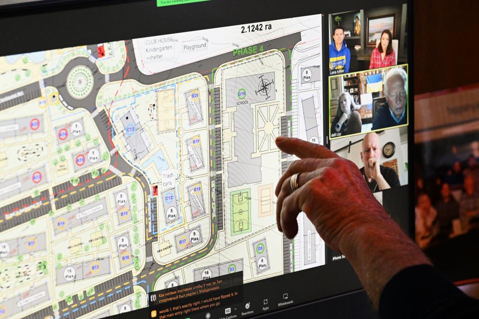 A computer rendering of a village and school is shown during a Zoom meeting with Dell Loy Hansen and his team, which is working in Ukraine, on Thursday, Sept. 28, 2023. | Scott G Winterton, Deseret News