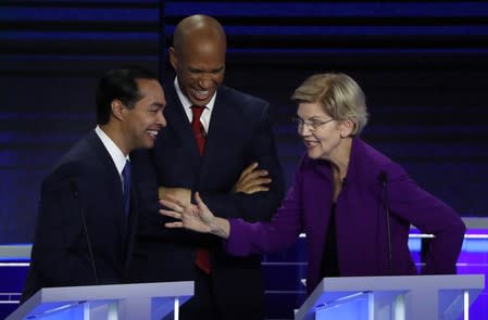 Candidates chat during a break at the first U.S. 2020 presidential election Democratic candidates debate in Miami, Florida, U.S.,