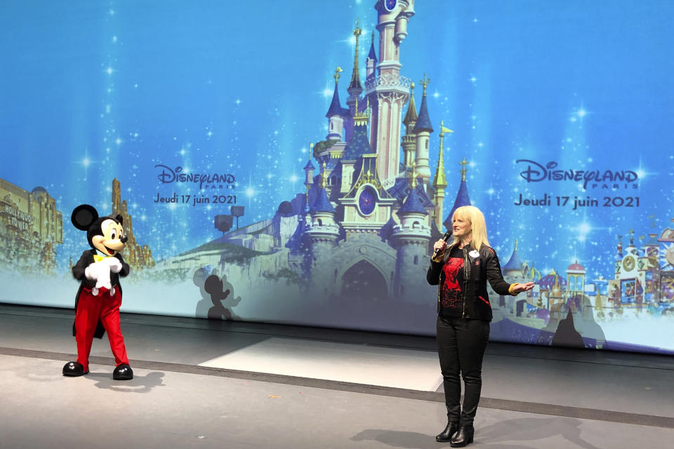 Natacha Rafalski,,President of Disneyland Paris, delivers her speech at the theme park in Marne-la-Vallée, east of Paris, Thursday, June 17, 2021. France's tourism sector takes a further step toward post-pandemic recovery with the reopening of Disneyland Paris, two weeks after the country formally welcomed back vaccinated foreign visitors. (AP Photo/Catherine Gaschka)