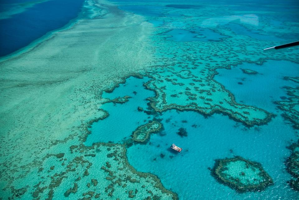 Natural Great Barrier Reef in Queensland. Aerial view of nature paradise with magnificent colors.. (Photo by: Gagliardi Giovanni /REDA&CO/Universal Images Group via Getty Images)