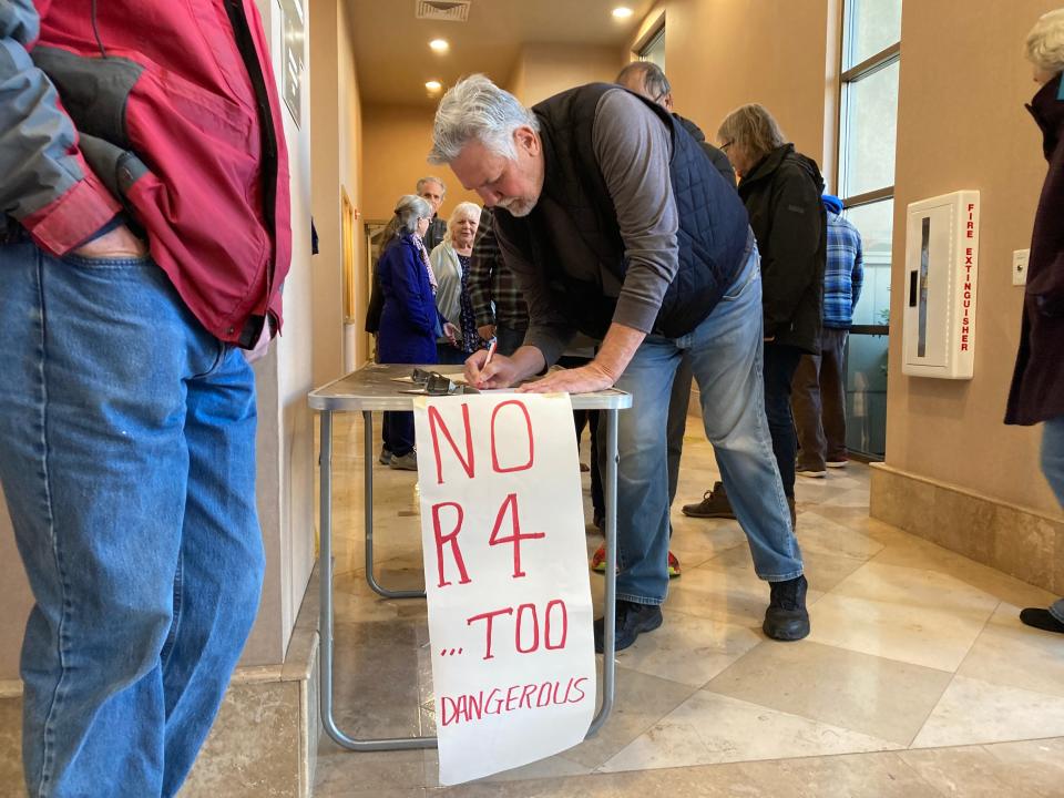 Residents lined up before the Tuesday, Feb. 21, 2023, Shasta County Supervisors meeting to a sign a petition denouncing the Second Amendment resolution and supporting the restriction of guns in public buildings.
