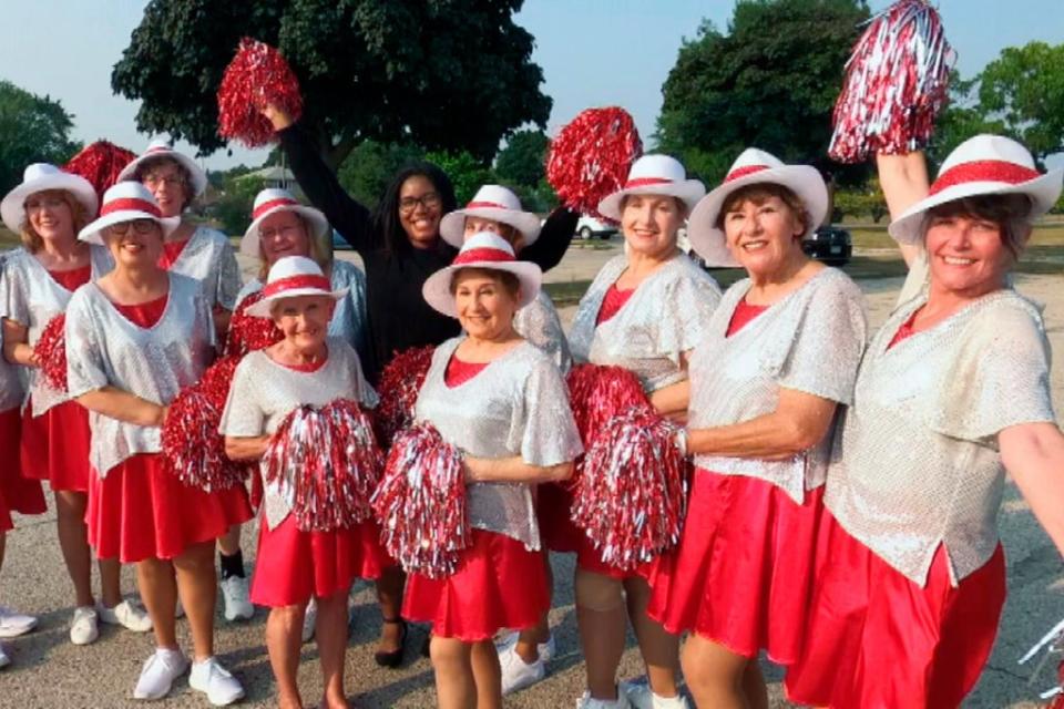 The Milwaukee Dancing Grannies, a marching, dancing holiday fixture in Wisconsin for nearly 40 years, was hit by tragedy on Sunday (AP)