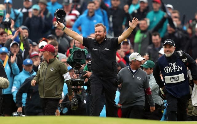 Shane Lowry celebrates on the 18th