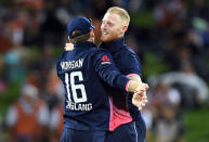 Cricket - ODI - New Zealand vs England - Seddon Park, Hamilton, New Zealand, February 25, 2018. England's Ben Stokes celebrates with team mate and captain Eion Morgan after dismissing New Zealand's Colin de Grandhomme during their one-day international match. REUTERS/Ross Setford