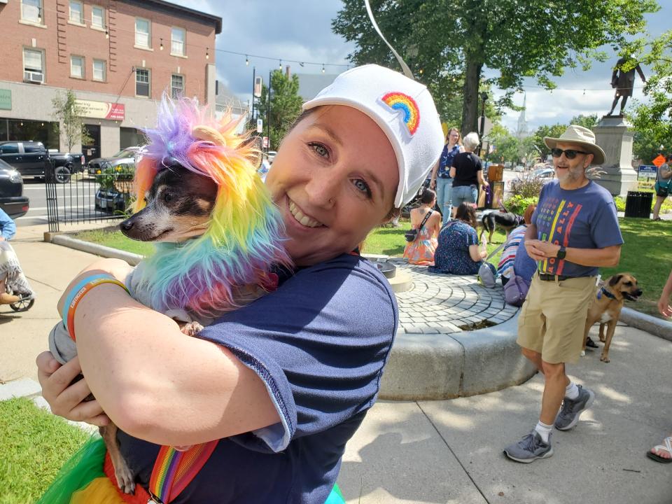 Danielle Erwin and Minnie lead the Wentworth-Douglass Hospital booth at Rochester Pride on Saturday, Aug. 27, 2022.