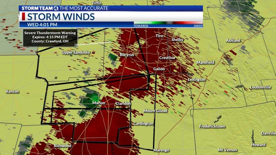 Doppler radar velocity data revealed two areas of rotation developing, where red and green indicate air moving away from/toward the radar site, indicating shifting winds in a narrow zone.