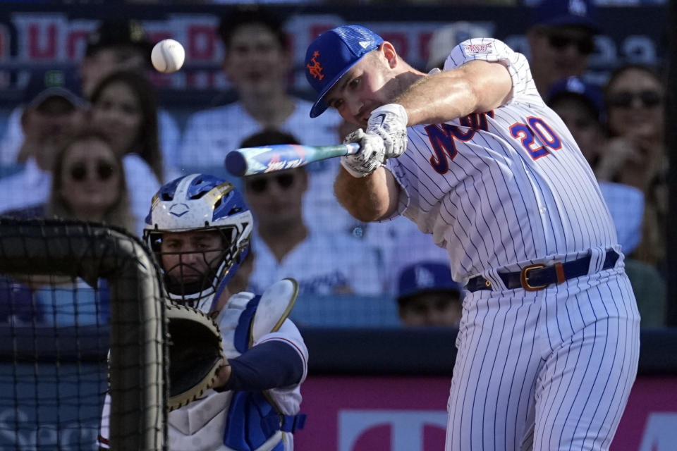National League's Pete Alonso, of the New York Mets, bats during the MLB All-Star baseball Home Run Derby, Monday, July 18, 2022, in Los Angeles. (AP Photo/Jae C. Hong)