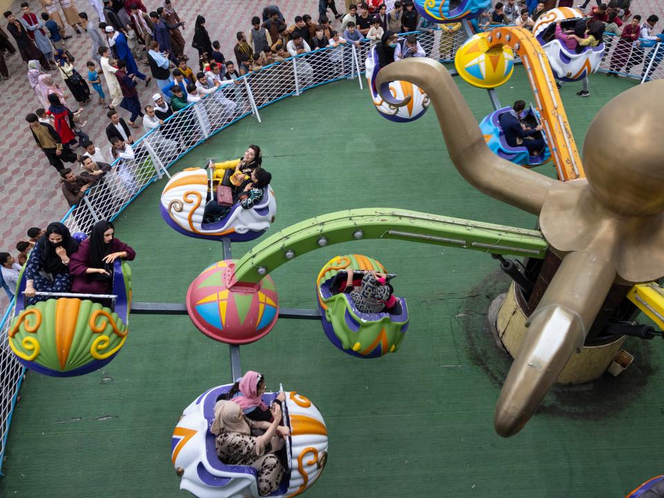 fghans enjoy the rides at Kabul City Amusement Park on the first day of Eid Al-Adha holiday on July 20, 2021 in Kabul, Afghanistan.