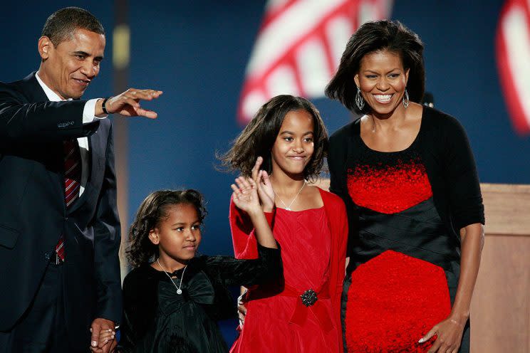 President-elect Barack Obama acknowledges his supporters along with his wife, Michelle, and daughters, Malia and Sasha, during election night 2008 in Grant Park in Chicago, Illinois. (Photo: Getty Images)