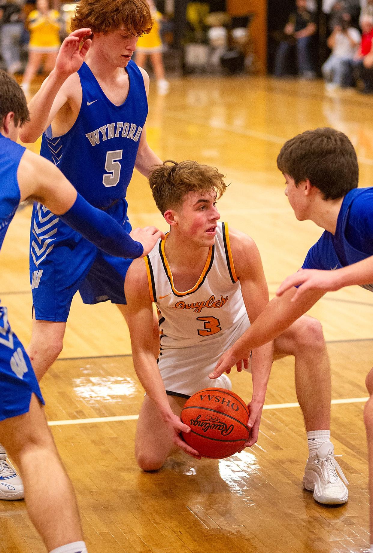 Colonel Crawford's Derek Horsley looks to pass the ball.