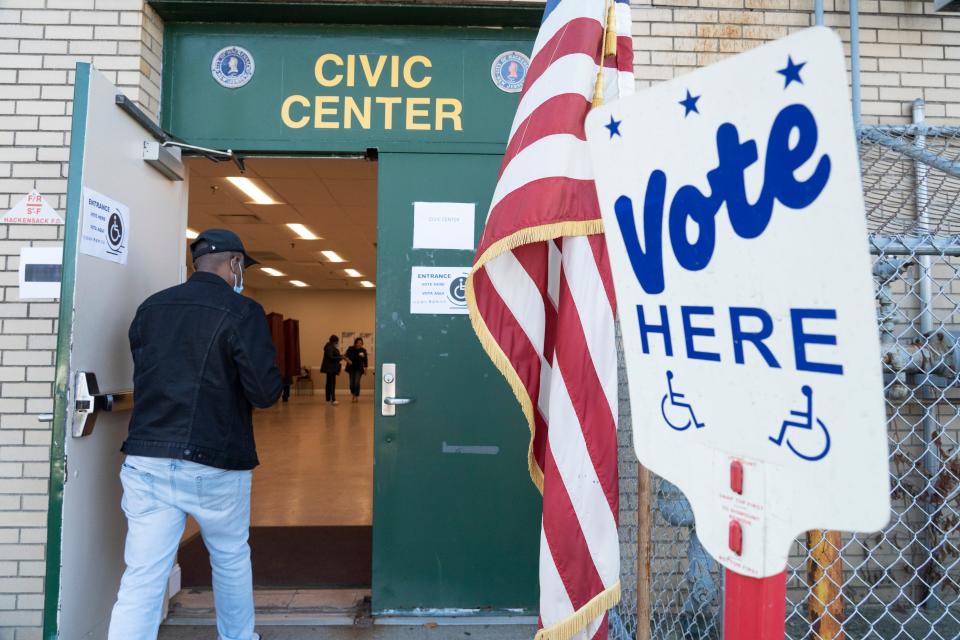 A voter enters the Civic Center to vote in Hackensack, N.J. on Tuesday Nov. 8, 2022. 