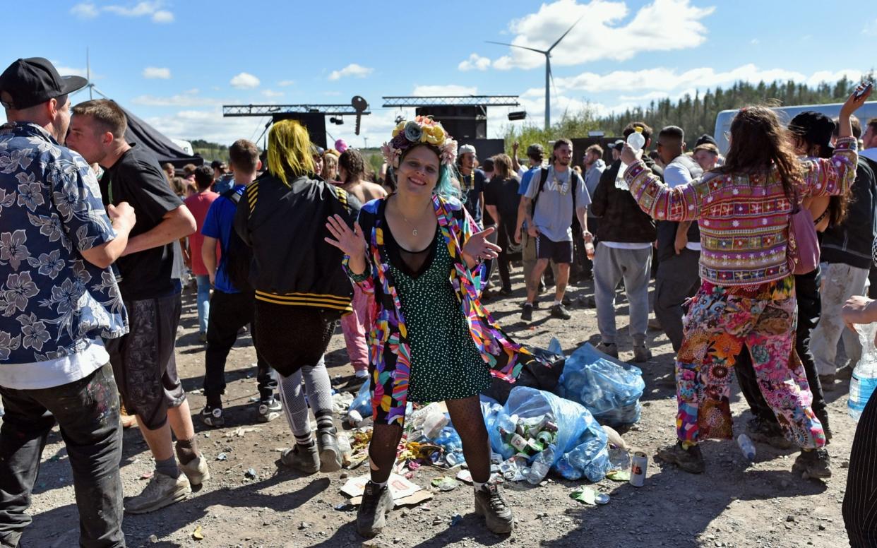 Rave which started in the early hours of Sunday in the forest at Neath Port Talbot, near the village of Banwen. Dancing to the music.  - Richard Swingler