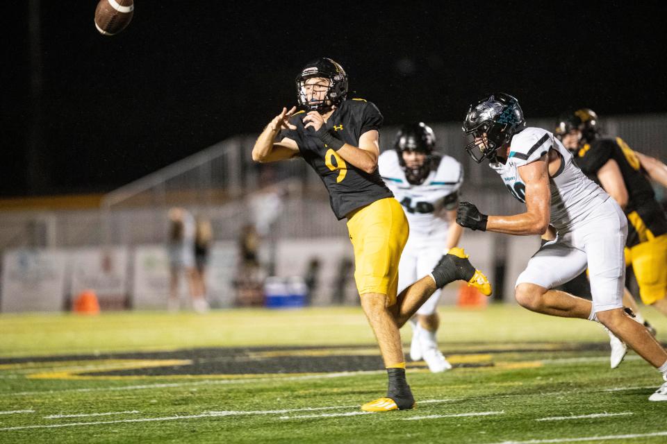 Carter Smith, the quarterback for Bishop Verot throws the ball for yards against Gulf Coast High School at Bishop Verot on Friday, Sept. 16, 2022. Bishop Verot won.  