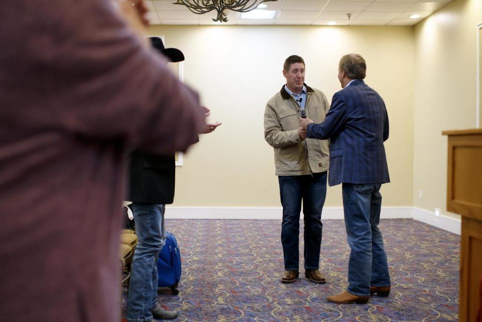 Beaumont, Texas: Texas Attorney General Ken Paxton shakes hands with David Covey during an endorsement event in Beaumont on Monday, Jan 15, 2024. Covey is running against House Speaker Dade Phelan in the Republican primary. Mark Felix/The Texas Tribune