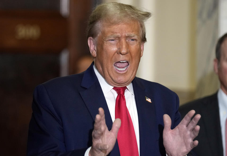 Former President Donald Trump arrives for his civil business fraud trial at New York Supreme Court, Tuesday, Oct. 17, 2023, in New York. (AP Photo/Seth Wenig)