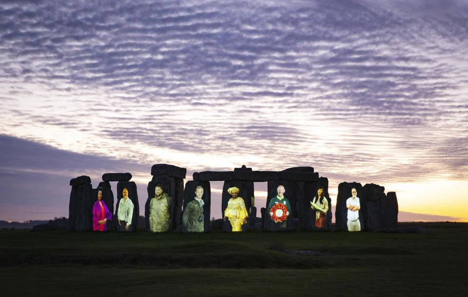 The 5,000-year-old sarsen stones of Stonehenge have been illuminated with images of unsung heritage champions from across the UK, who with the help of National Lottery funding, have kept heritage accessible during the pandemic and beyond