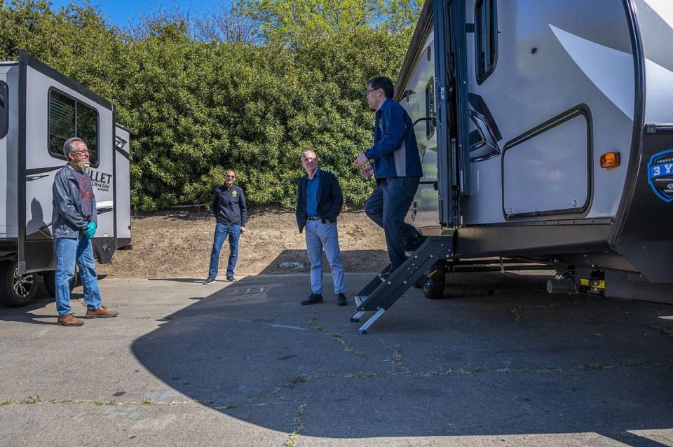 Sacramento City Councilman Jay Schenirer, Assemblyman Kevin McCarty, Mayor Darrell Steinberg and state Sen. Richard Pan view some of the two dozen state-issued trailers, provided to enable at-risk people to self-quarantine during the COVID-19 pandemic, on April 3, 2020, at Cal Expo. The travel trailers are part of Gov. Gavin Newsom’s $150 million funding plan to protect vulnerable populations, including people experiencing homelessness, and slow the spread of the coronavirus.