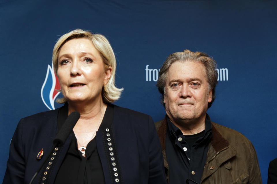 Steve Bannon with France’s Marine Le Pen at a press conference last March. (Photo: Sylvain Lefevre/Getty Images)