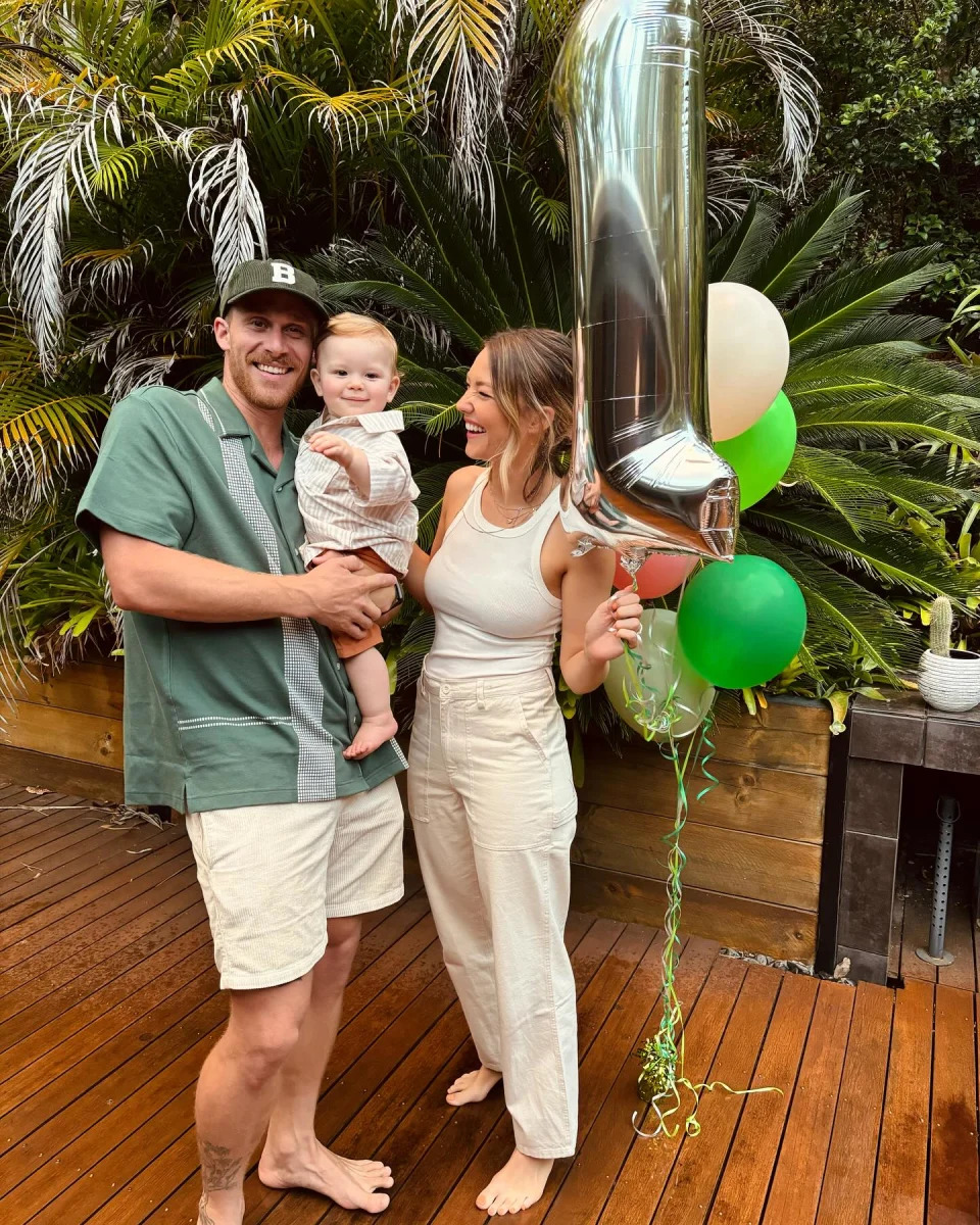 Sam Frost and Jordie Hansen with their son