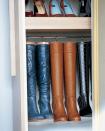 <div class="caption-credit"> Photo by: Martha Stewart Living</div><b>Boot Hangers</b> <br> Homemade hangers preserve the shape of tall boots and maximize space. They're created by replacing the knobs on cedar boot trees with large cup hooks, which are screwed into the tops. The trees and boots then hang from a cafe-curtain rod. <br> <b>Related:</b> <br> <b><a href="http://www.marthastewart.com/275539/bedroom-decorating-ideas/@center/277006/bedroom-and-bathroom-decorating?xsc=synd_yshine" rel="nofollow noopener" target="_blank" data-ylk="slk:23 Ways to Decorate Your Bedroom" class="link ">23 Ways to Decorate Your Bedroom</a> <br> <a href="http://www.marthastewart.com/275280/bathroom-organization-tips/@center/277006/bedroom-and-bathroom-decorating?xsc=synd_yshine" rel="nofollow noopener" target="_blank" data-ylk="slk:24 Ways to Organize Your Bathroom" class="link ">24 Ways to Organize Your Bathroom</a></b> <br>