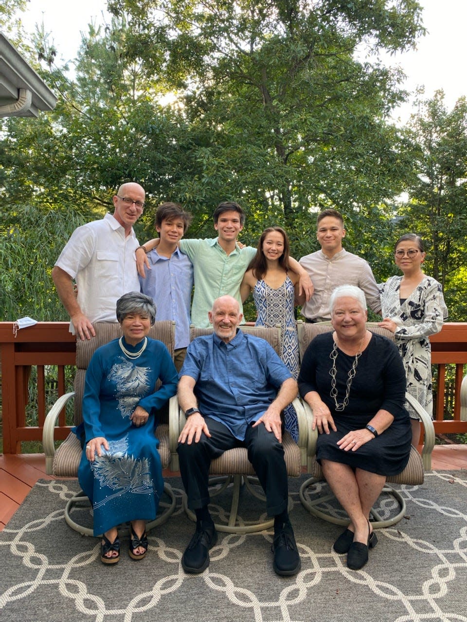 Thuan Le Elston, right, with her husband, their four children, and her mother and parents-in-law in September 2021 in Northern Virginia.