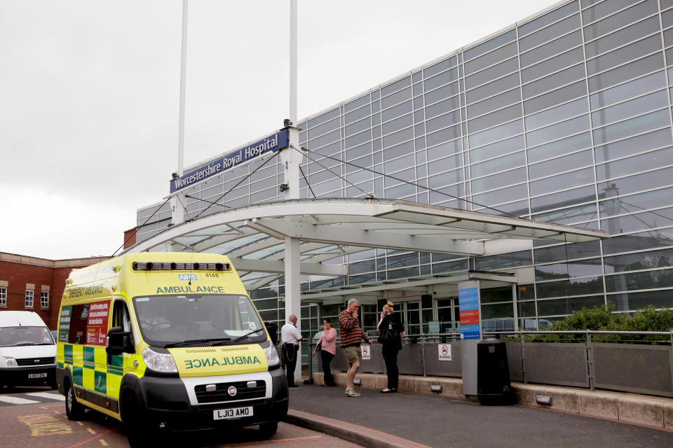 FILE PICTURE - General View of Worcestershire Royal Hospital with an ambulance outside. See SWNS story SWMDambulances.  A staggering 23 ambulances were forced to queue outside an overstretched A&E department just weeks after a patient died in one while waiting for treatment.  The huge jam was the second in a matter of days as staff at Worcestershire Royal Hospital were overwhelmed with patients struck down by flu and the norovirus.  Last Monday (23/12) was the busiest day for the hospital with 182 patient admissions. Paul Brennan, deputy chief executive of Worcestershire Acute Hospitals NHS Trust, said: âDemand on our emergency departments continues to be very high and the Christmas period has remained very busy with ambulance arrivals up nine per cent this year compared to last year.